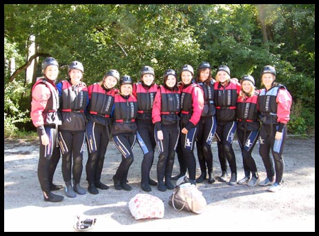 The group all wet-suited up and ready to rock and roll!